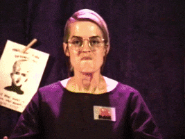 Video gif. A woman grits her teeth and looks around as she repeats the word, “Hell” in weird, over exaggerated ways. The video overlaps with other semi transparent shots of her saying hell in angrily, but funny ways. One shot shows her looking around and saying hell like she’s huffing out a big breath, another she yells it while giving a sinister look to the camera, and another she is just wiggling her arms and legs around in a tight motion. 