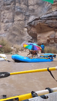 Torrent of Water and Debris Floods Into Grand Canyon