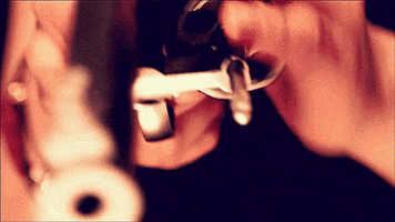 russian roulette woman GIF