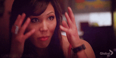 TV gif. Michaela Conlin as Angela in Bones puffs her cheeks up and brings her hands to her forehead, then moves her hands outward as she releases the air from her mouth as if to say, “Mind blown.”