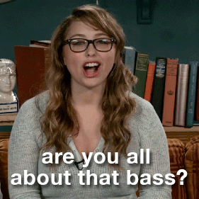 GIF of a woman in glasses asking the question are you all about that bass.