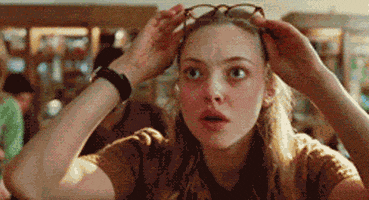 Amanda Seyfried Putting On Glasses GIF