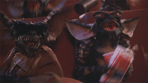 gremlins laughing GIF