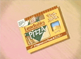 Video gif. Vintage-looking Lunchables Pizza Fun Pack sliding in and out of the box.