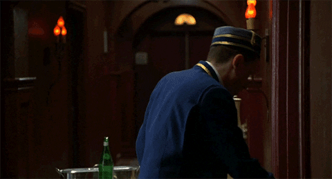 tim roth bellboy GIF