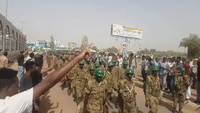 Soldiers March Outside Khartoum Military Headquarters Amid Continued Anti-Government Protests
