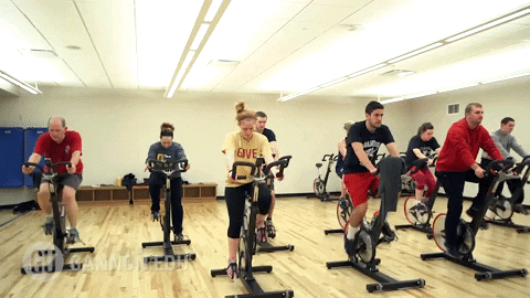 people biking in a gym
