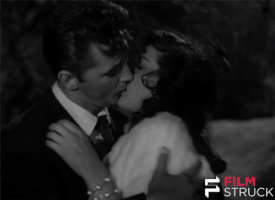 kissing robert mitchum GIF by FilmStruck