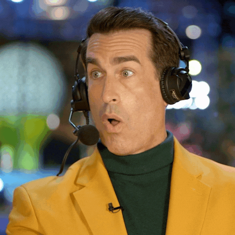Reality TV gif. Rob Riggle as a host of Holey Moley. He stares at the gameplay with his jaw dropped and his eyes filled with shock.