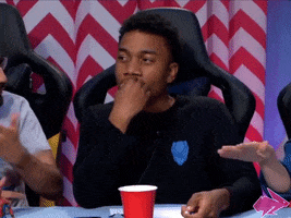 Video gif. Naeem on Hyper RPG waves his hand emphatically while saying, "we don't talk about that," which appears as text.
