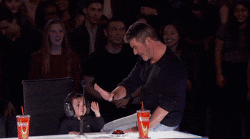high five simon cowell GIF by America's Got Talent