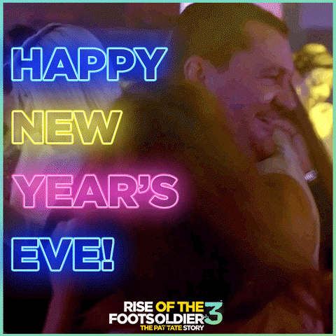 Movie gif. We see Craig Fairbrass as Pat Tate from Rise of the Footsoldier 3, dancing closely with a shorter blonde woman in a flashy night club. Neon-colored Text, "Happy New Year's Eve!"