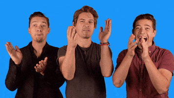 Celebrity gif. The members of Hanson: Taylor, Zac and Isaac Hanson applaud enthusiastically against a bright blue background.