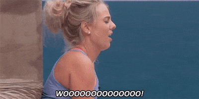 Reality TV gif. A excited woman on Big Brother yells, “WOOOOOOOOOOOOO!”
