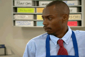 amused dave chappelle GIF
