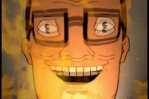 TV gif. A close up of Hank from King of the Hill as he cackles evilly. The gif has been edited to overlay lapping flames in front of his face with an extreme close up to show his bulging, crazy eyes.