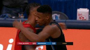 dallas mavericks hug GIF by NBA
