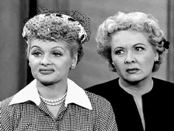 Video gif. Lucille Ball and Vivian Vance as Lucy and Ethel from I Love Lucy giving discerning, thoughtful looks.
