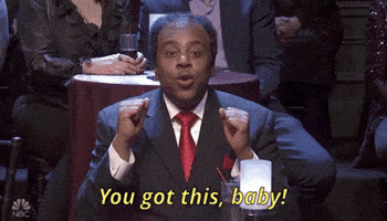 SNL gif. Comedian Kenan Thompson sits at a club table in a suit, raises his fists in encouragement and says "You've got this, baby!"