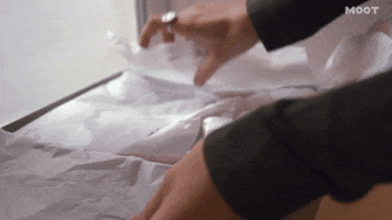 unwrapping high heels GIF by MOOT