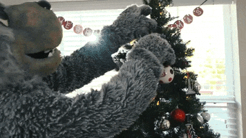 decorating christmas tree GIF by NC State University