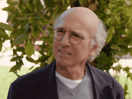 TV gif. Larry David from Curb Your Enthusiasm tilts his head and narrows his eyes in confusion--or maybe disbelief? Either way, he doesn't understand what's happening.