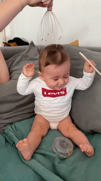 Toddler Discovers Bliss of Head Massage