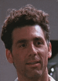 Seinfeld gif. Michael Richards as Kramer nods his head and raises his eyebrows in agreement.