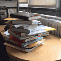 sethkelley books messy papers pile GIF