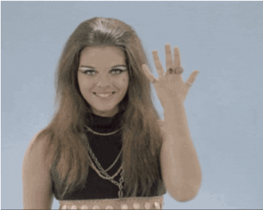 Animated gif of a woman with the word, Hi, written on her hand.
