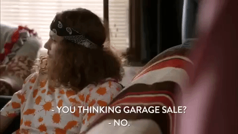 a gif of a man shaking his head ''no.'' The text reads: ''You thinking a garage sale?''