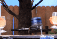 Cartoon gif. A scene from Robot Chicken with two arms sticking out and clinking glasses as they cheers together.