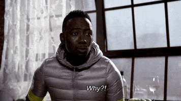 TV gif. Larmome Morris as Winston Bishop on New Girl wears a tight silver ski jacket. He says, “Why?!” with an almost painful expression on his face that quickly melts into a serious, unamused expression.