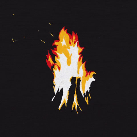 hands warming around a fire for imbolc gif