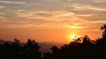 turndriverside tower mountains sunset time lapse GIF