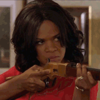 Kimberly Elise Gun GIF by Almost Christmas Movie