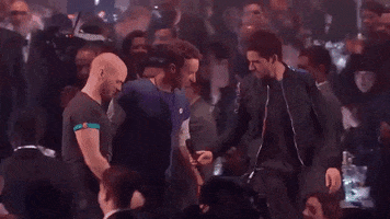 coldplay passing GIF by BRIT Awards