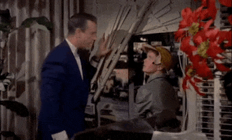 classic film hiding GIF by Warner Archive