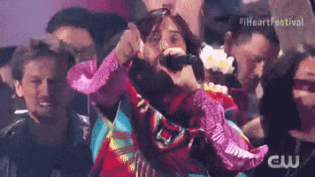 pointing poncho GIF by iHeartRadio