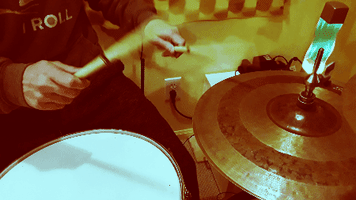 drumming slow motion GIF