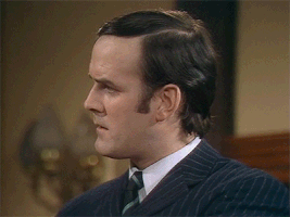 TV gif. John Cleese as a merchant banker on Monty Python’s Flying Circus looks away from someone then at the ground with concern. He then whips his head back around and squints his eyes as he says, “Are you quite sure you’ve got this right?”