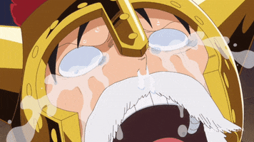 Anime gif. A white mustached Luffy from One Piece wears a gold helmet and cries with tears like fountains. 