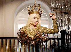 queen touching her crown