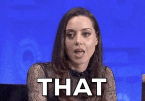 Celebrity gif. Aubrey Plaza looks down with wide eyes and enunciates the word, "That."
