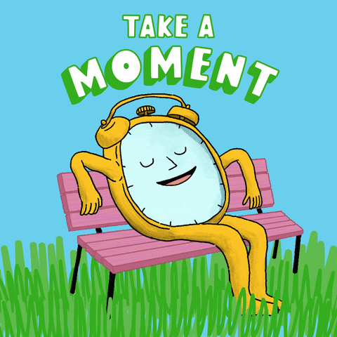 Digital art gif. Illustration of a yellow alarm clock with arms, legs, and a face sits on a pink park bench amid grass and a blue sky with its eyes closed, snoozing peacefully. Text, "Take a moment."