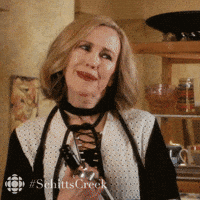schitts creek kiss GIF by CBC