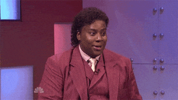SNL gif. Kenan Thompson as Diondre Cole perks up with intrigue, looking around wide-eyed and smiling as if to gauge onlookers' reactions.