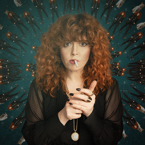 An animated GIF of Natasha Lyonn from Russian Doll. There is a picture of her staring into the camera, lighting a cigarette, and then little images coming out behind her like a kaleidoscope.