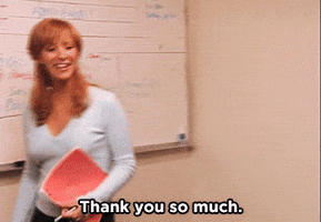 TV gif. Lisa Kudrow as Valerie Cherish in The Comeback tucks a red notebook underneath her arm to put her hands in a prayer position and quickly bow in the front of the classroom. She smiles and says, "Thank you so much," before making her exit.