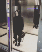 dancing in the lift GIF